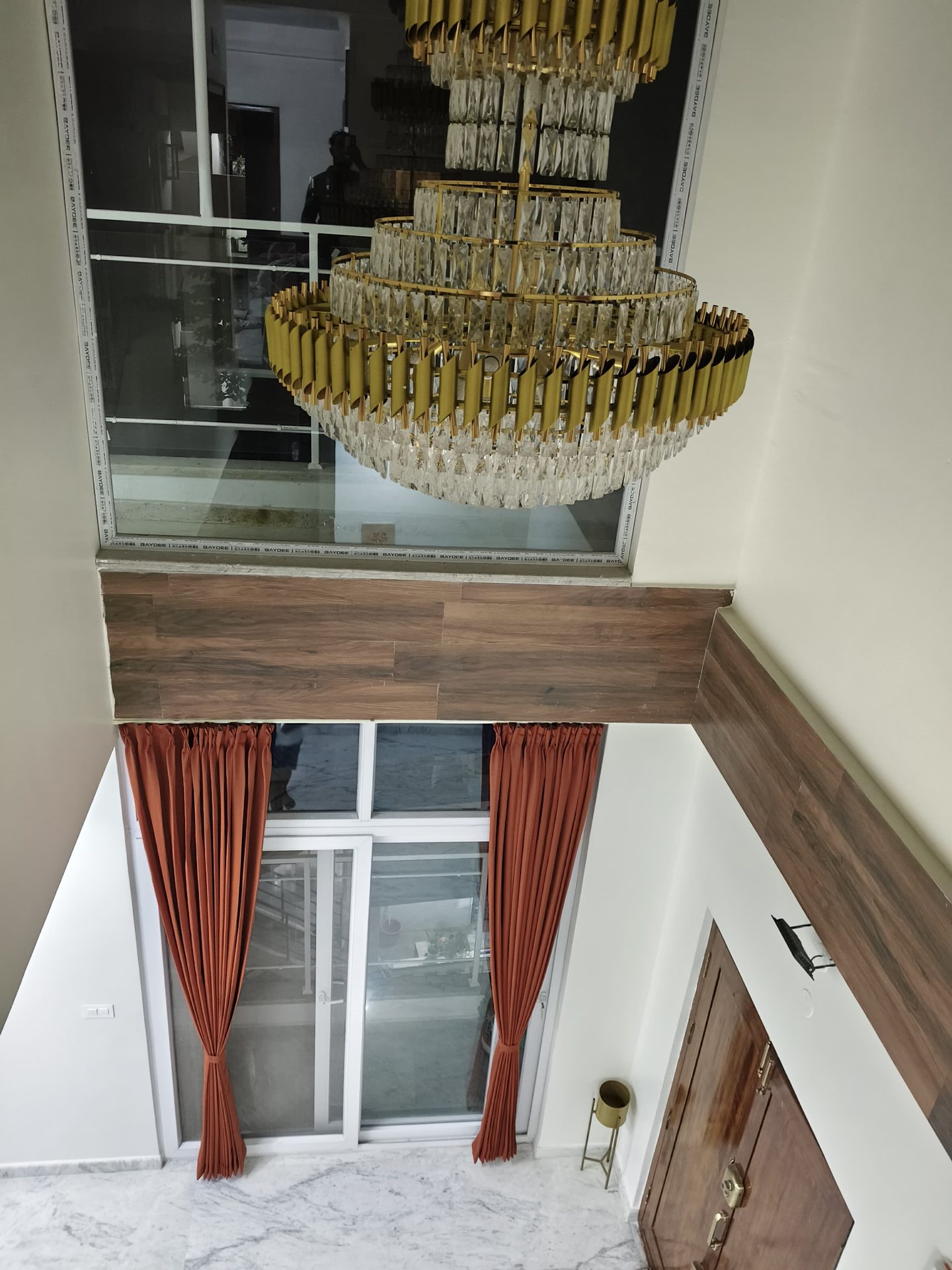 Double-Height Window — Rust drape